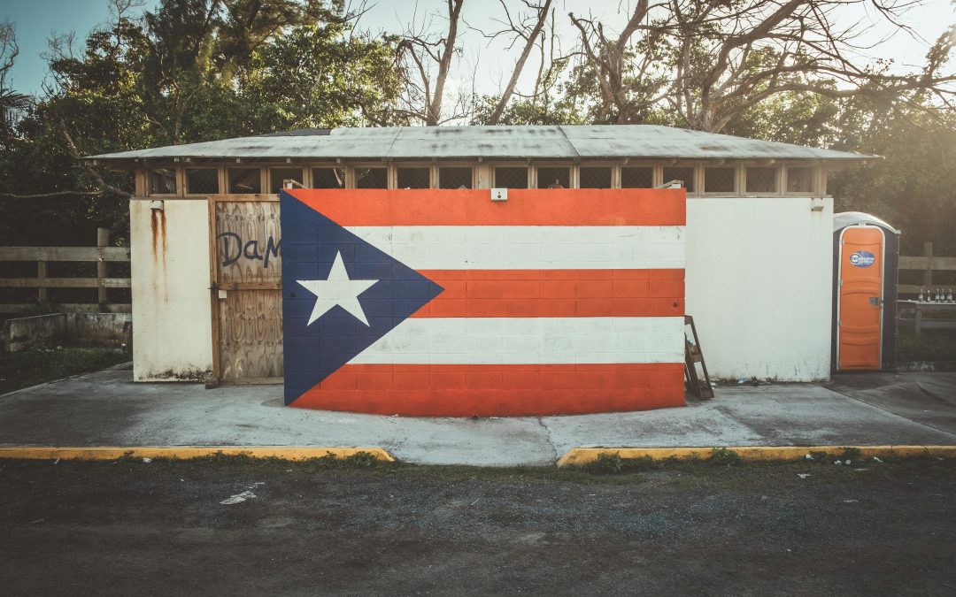 Photo of the puerto rico flag painted on the side of a wall do you need a passport?
