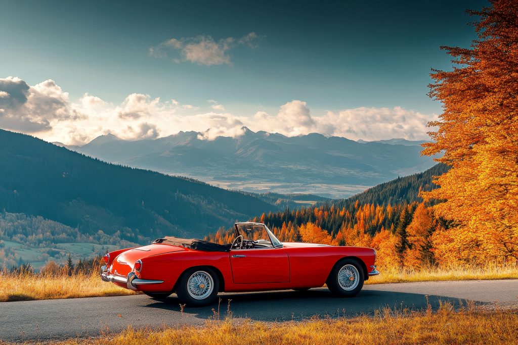 A classic car red convertible sports car in autumn mountains car is perfect for transport of classic cars services from direct connect